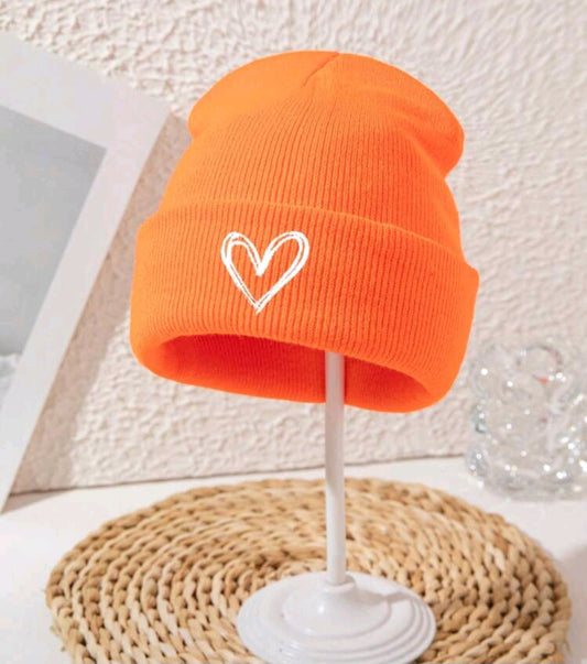 Warm hats with heart decor - a colorful expression of comfort ❄️❤️