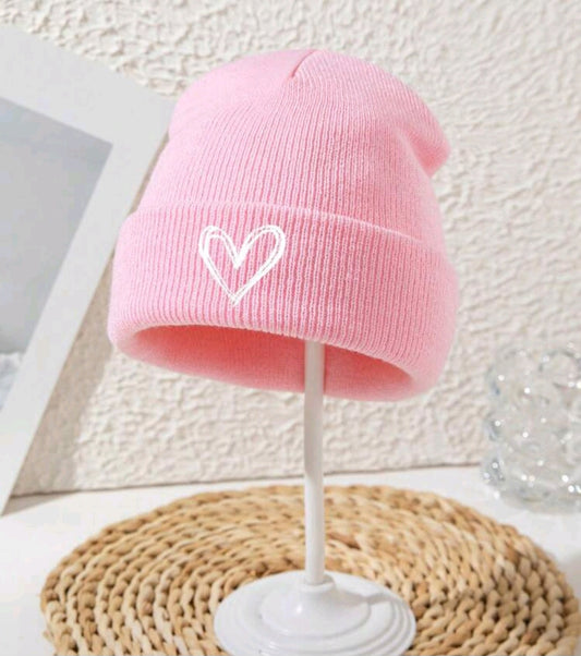 Warm hats with heart decor - a colorful expression of comfort ❄️❤️