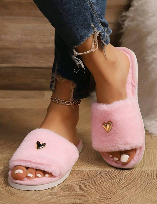 Plush slippers with a golden heart - warmth and style for every step 💛🩰