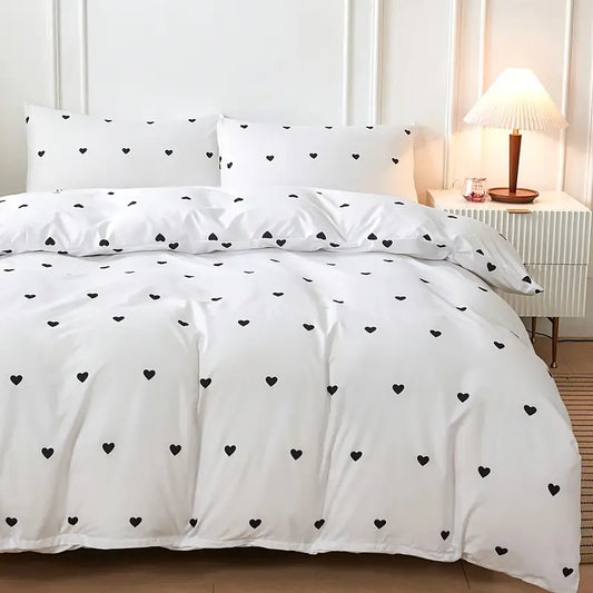 Solid color bedding set with heart pattern made of polyester