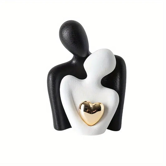 Modern ceramic statuette with a golden heart