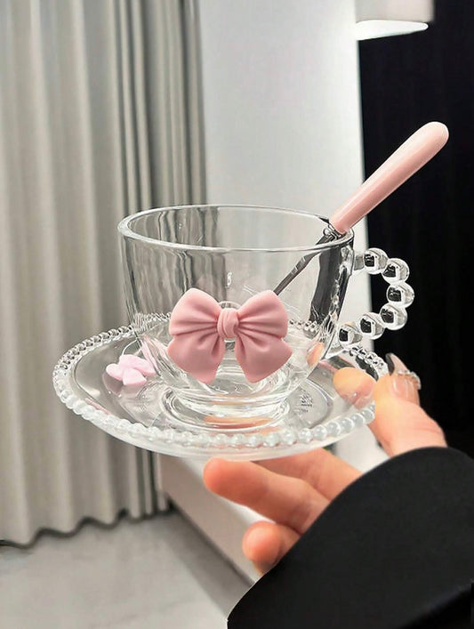 Glass cup with saucer and pink ribbon - elegance for everyday use
