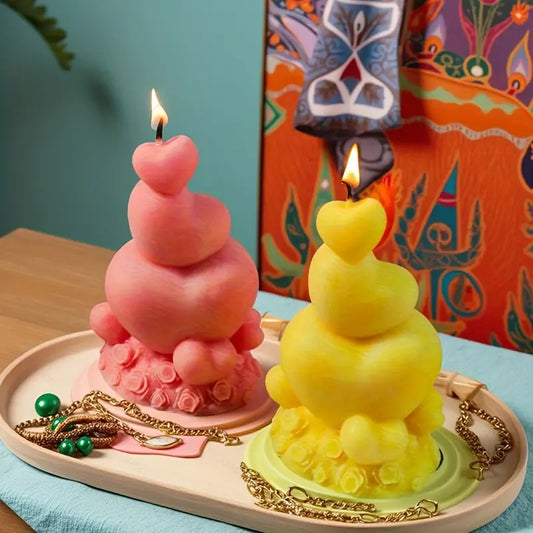 Three-tiered heart-shaped candle