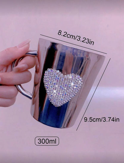 Prabangus nerūdijančio plieno puodelis su kristaline širdimi