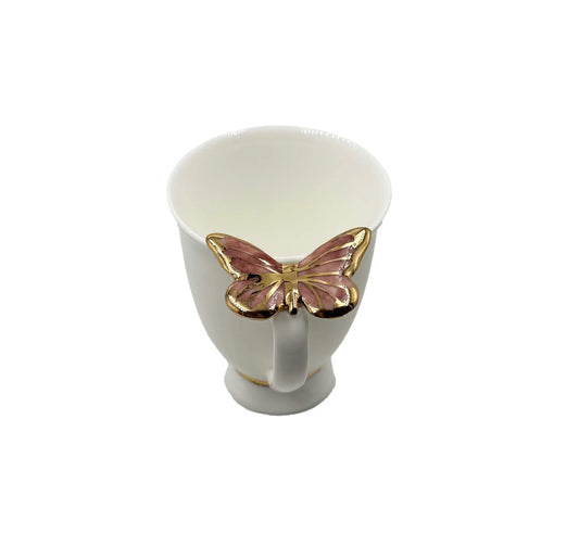 Puodelis su rožiniu drugeliu